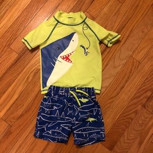 Carter’s swim top and swim shorts! 18 months